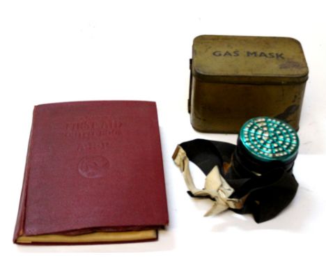 WW2 British Home Front lot comprising of "The Complete First Aid Outfit Book and ARP" which opens to reveal a First Aid outfi
