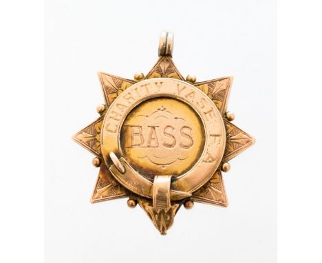 Football Medal: Derby County Interest - A 9ct gold football medal, inscribed to both sides, to front "Charity Vase F.A. Bass"