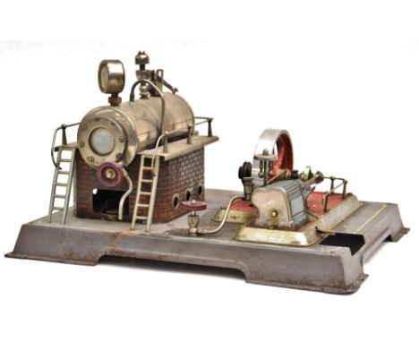 Doll & Cie: A German tinplate live steam plant by Doll & Cie (Nuremberg), powered by a single cylinder horizontal engine with
