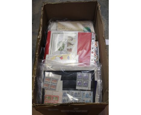 One box of assorted stamps to include First Day Covers, loose and others various 