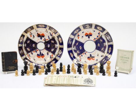 A boxed set of Bexwood chess men, packs of playing cards, including chaser playing cards and a pair of large saucers 19th Cen