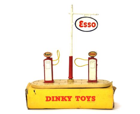 Dinky: A Dinky Toys No.781 "Petrol Pump Station" 'ESSO', first example from 1955-1962, comprising; two Petrol Pumps "ESSO EXT