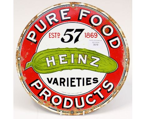 A Heinz circular enamel sign, 1983.