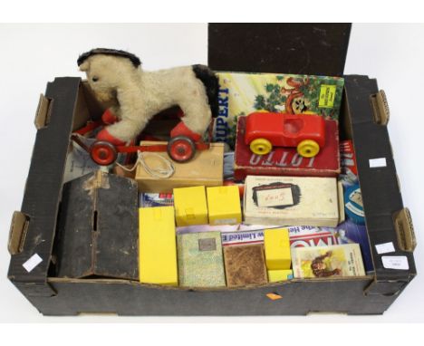 A Chiltern pull along horse; Dinky tyres; board games; etc 