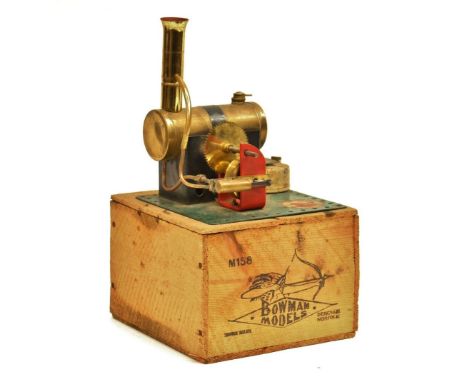 Bowman: A BOWMAN M158 "Double Powered" Steam Engine Horizontal Steam Engine with a flywheel mounted on a 14cm x 14cm green me