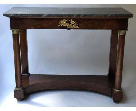 CONSOLE TABLE, early 19th century, French Empire flame mahogany and gilt metal mounted, with marble top above a secret frieze