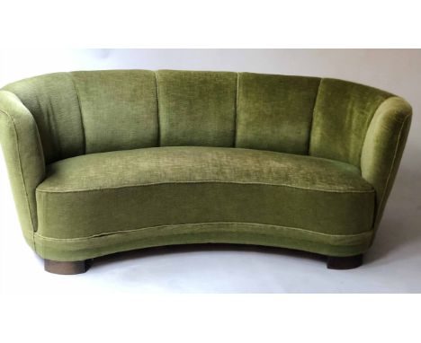 ART DECO STYLE SOFA, of curved form with green velvet corded upholstery, 176cm W.