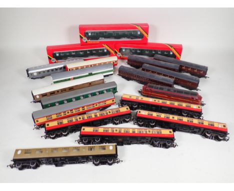 Three boxed Hornby 00 gauge Southern Region Coaches, fifteen unboxed Coaches including B.R. and L.N.E.R., three bogie Wagons 
