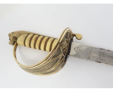 A Royal Navy Officer's Sword with white shagreen effect Sword within leather and brass scabbard