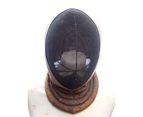 An early 20th Century Wilkinson Sword Fencing Mask with wire gauze face cover and leather ear guards and throat protector 
