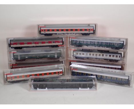 Ten boxed Fleischmann HO Coaches 