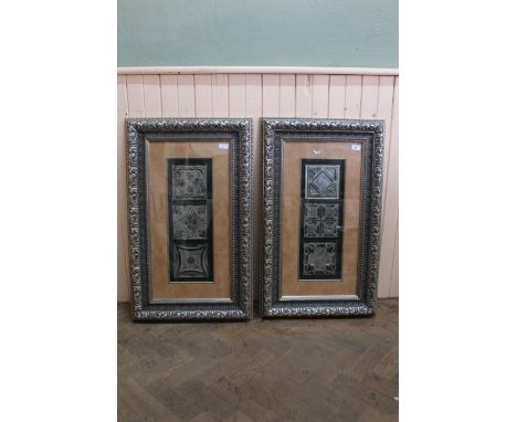 A pair of framed three tile panels