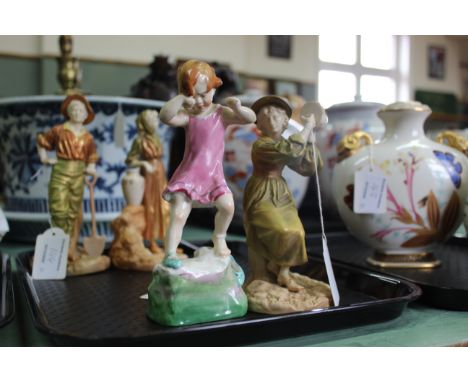 A Royal Worcester figure of a female tambourine player after James Hadley plus a Royal Worcester figure 'Wednesdays Child is 