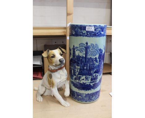 A composition model of a Jack Russell and a blue and white stick stand