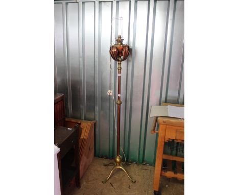 A copper and brass oil lamp converted to standard lamp by W.A.S Benson