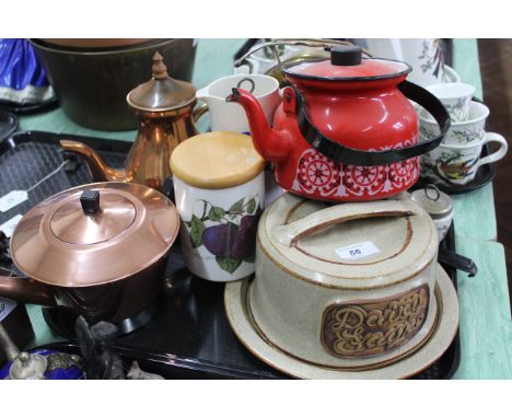 A tray of kitchen items including a pottery cheese dish, plated gong on stand, a copper teapot and coffee pot, a Horlicks mix