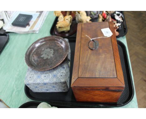 An antique mahogany veneered double tea caddy (age related wear and some damage, replacement inner glass bowl) with an Arts a