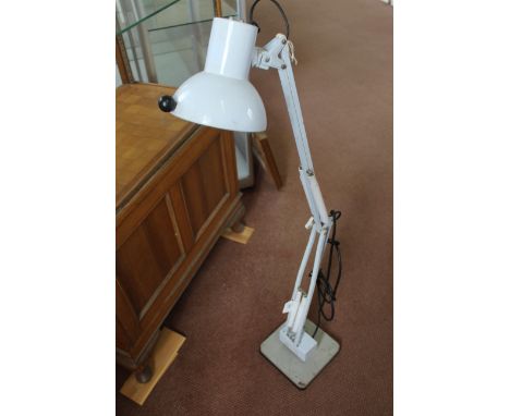 An adjustable desktop inspection lamp