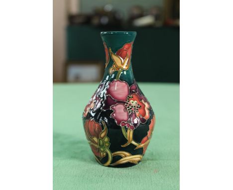 A Moorcroft 'Carolina Moon' pattern vase, 2006 by K Goodwin, 5 1/2" tall