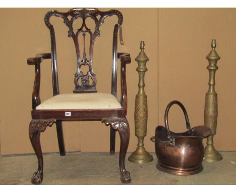 An Edwardian Chippendale revival open elbow chair with pierced splat, shaped arms, drop-in upholstered seat and claw and ball