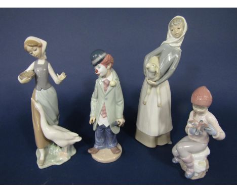 Four Lladro figures to include two farm girls, a girl holding a bird and a clown (4) 