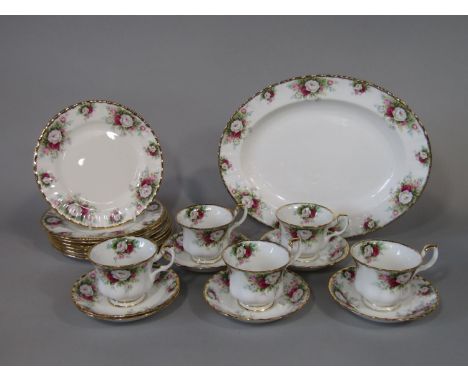 A collection of Royal Albert Celebration pattern wares comprising an oval meat plate, five cups, six saucers and seven tea or