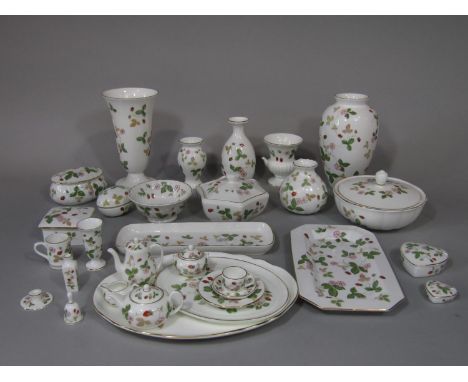 A collection of Wedgwood Wild Strawberry pattern wares comprising six vases, various lidded trinket boxes including heart sha
