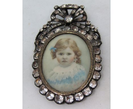 H Maquet? (late 19th early/20th century school) - Bust length miniature&nbsp;portrait of a young girl with brown eyes, blue r