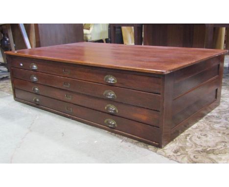 A vintage mahogany plan chest, fitted with four long drawers, with brass cup handles, flanked by panelled sides, approx 150cm