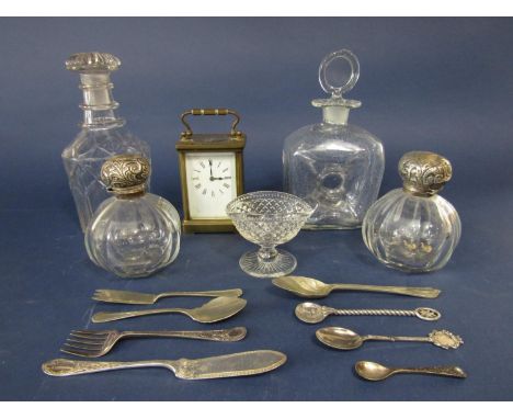 A mixed collection of glassware to include two silver lidded faceted scent jars, two further decanters, a hobnail cut glass s