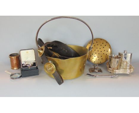 A box containing a collection of metal wares to include horse brasses, jam pan, chestnut roasting pan, silver plated hip flas