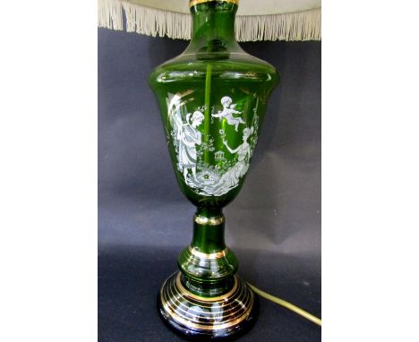 Mary Gregory type green glass baluster lamp base with white overlay of a classical romantic scene with a cherub, further gilt
