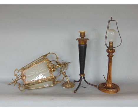 A cast brass hall lantern of pentagonal form, complete with ceiling shade and a blue and gilt carved timber table lamp, toget