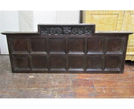 An antique oak panel overmantel, with further carved detail including owl mask, scrolls, quafoils, etc, 76cm high x 180cm lon