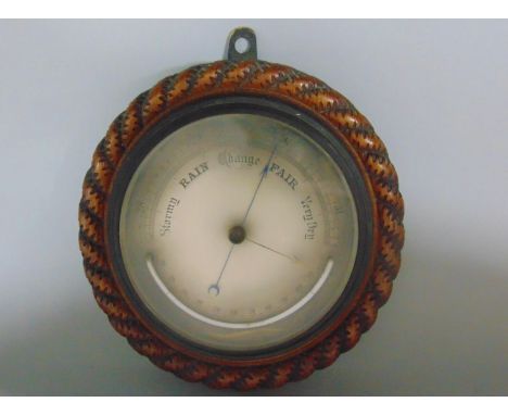 Rope twist aneroid barometer/thermometer, silvered engraved dial, 24cm diameter 