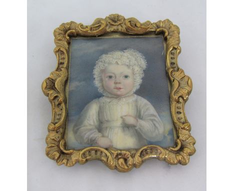 Early 19th century British school - Half length miniature&nbsp;portrait of a baby in white lace bonnet and white dress agains