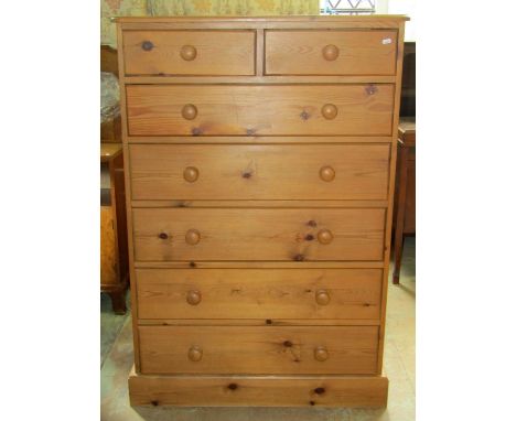A Victorian style stripped pine bedroom chest of two short over five long drawers and moulded plinth, 92 cm wide x 46 cm deep
