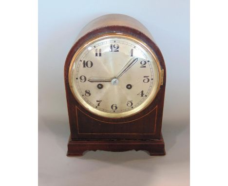 English 14 day two train chiming mantle clock, with silvered dial and enamelled Arabic numerals striking on a gong, 30cm high