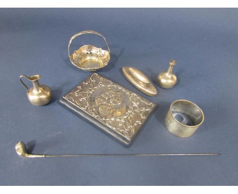 A mixed collection of silver to include a silver fronted address book, embossed with cherubs, a silver hat pin in the form of