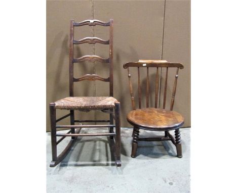 A rush seated ladder-back rocking chair with pierced and shaped splats together with a Swedish stained beechwood stick-back c