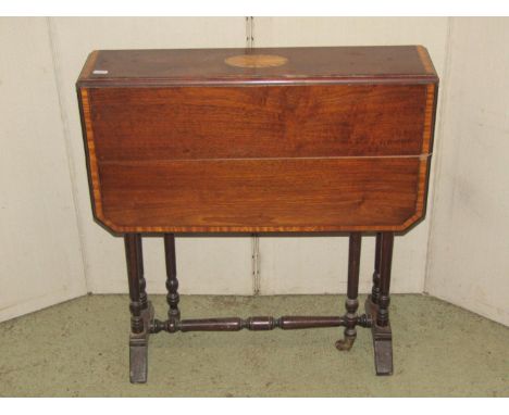 An inlaid Edwardian mahogany drop-leaf Sutherland type tea table with satin-wood cross-banding and further inlaid detail rais