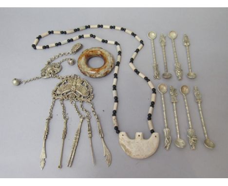 Oriental bijouterie lot to include a set of eight white metal apostle spoons, white metal chatelaine, jade type bangle, hards