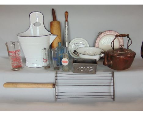 A mixed collection of antique kitchenalia to include various enamel wares, a copper kettle, three hot chocolate mixers, all w
