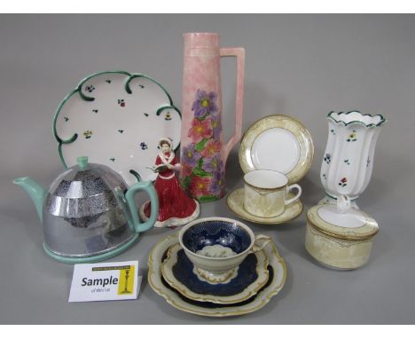 A collection of Royal Worcester Brocade pattern tea wares comprising milk jug, covered sugar bowl, nine cups, six saucers and