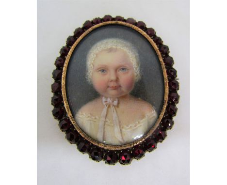 Early 19th century British school - Bust length miniature portrait of a baby with blue eyes in white bonnet and dress, probab