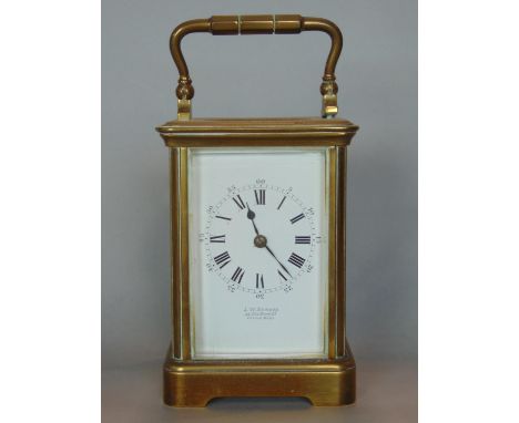 J W Benson carriage clock, the enamel dial with Roman and Arabic numerals, striking on a gong with twin drive movement, 11.5c