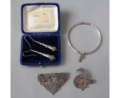 Silver jewellery comprising two late 20th century Tain Silver Celtic style brooches by Rita Scott, a pair of tapered drop ear