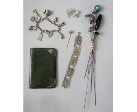 Mixed lot to include a yellow metal stick pin set with a seed pearl, an Edwardian silver hat pin embossed with a lady, maker 