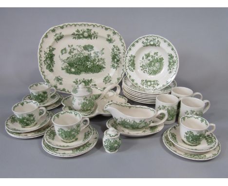 A collection of Masons Ironstone Fruit Basket pattern wares in the green colourway, comprising an oval meat plate, a trefoil 