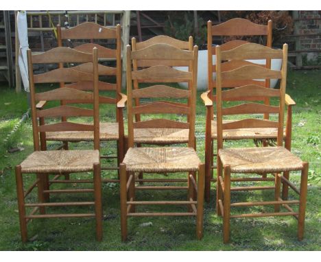 A mid 19th century good quality set of six (4+2) ash-wood ladder-back dining chairs, with rush seats 